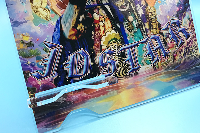 王冠と鮮やかな彩りが輝くアクリルスマホスタンド