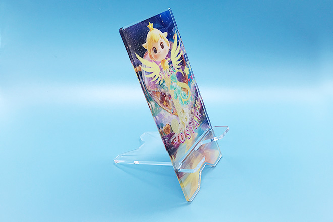 異空間に輝くちびキャラのアクリルスマホスタンド